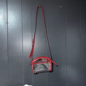 Vince Camuto Transparent Bag with Red Accents